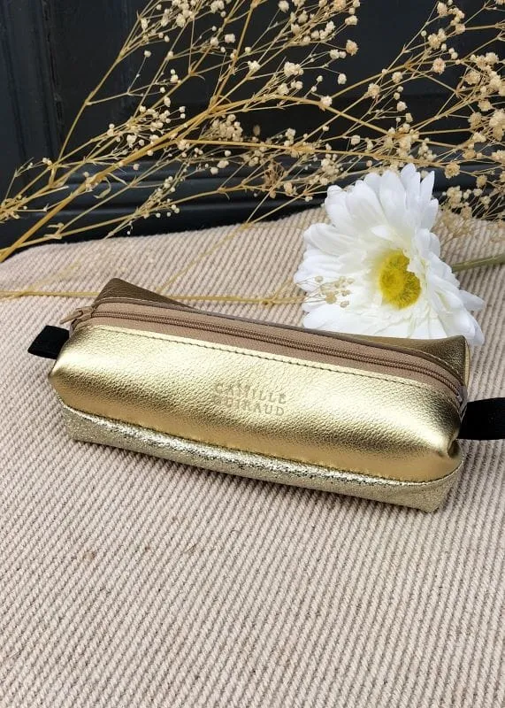 Camille Guiraud Trousse cuir doré caviar trousse maquillage