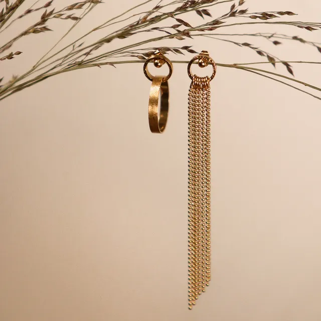 Kim Jude Points.à.la.ligne boucles d'oreilles simples